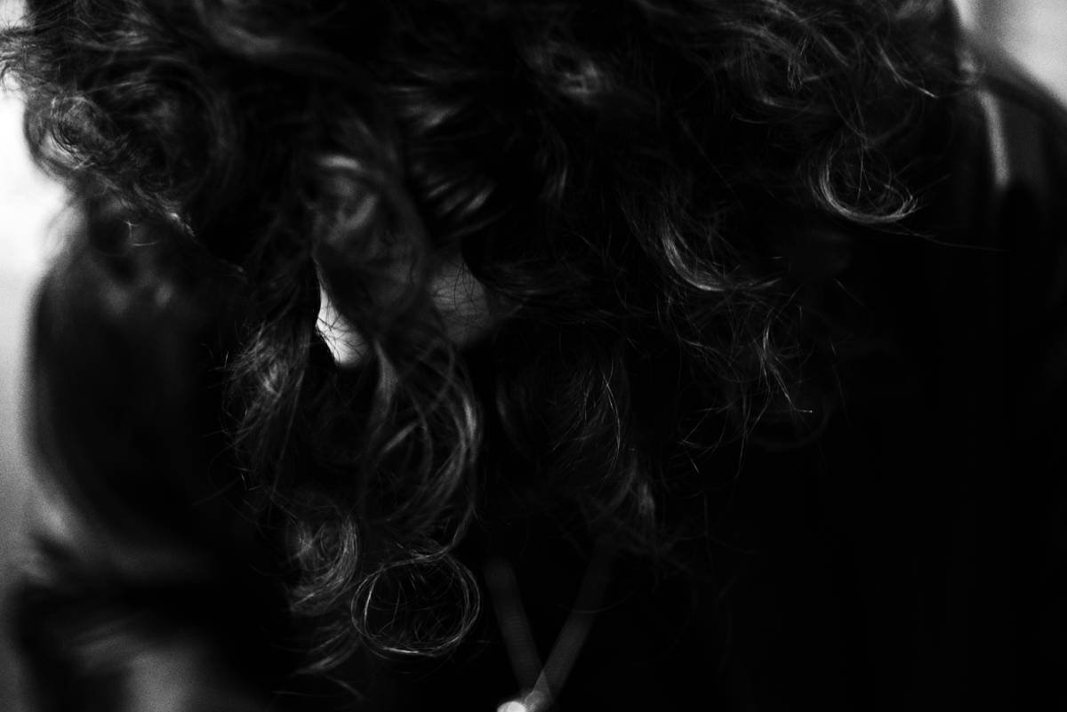 The Best Hair Spray for Curls: Why Your Coils Deserve More Than Stiff, Flaky Hold