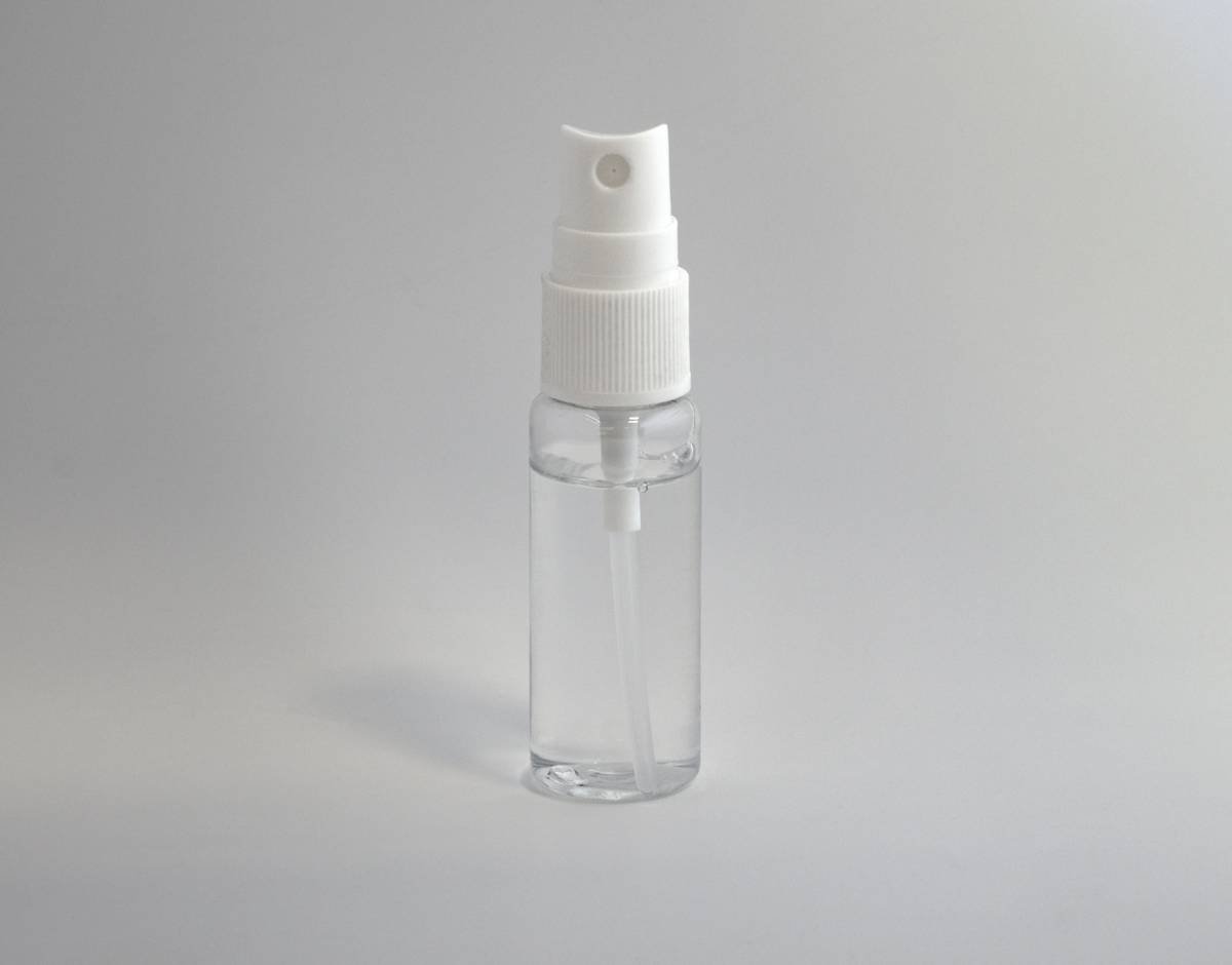 Before: dull, frizzy shoulder-length hair. After: sleek, reflective waves with glossy finish spray